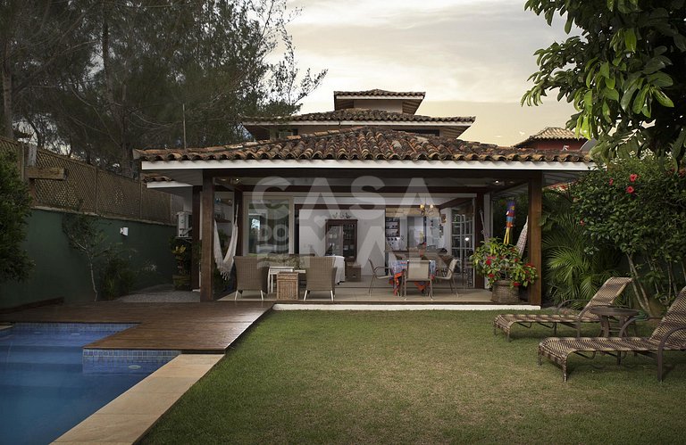 casa com quatro suítes, condomínio, frente mar, piscina