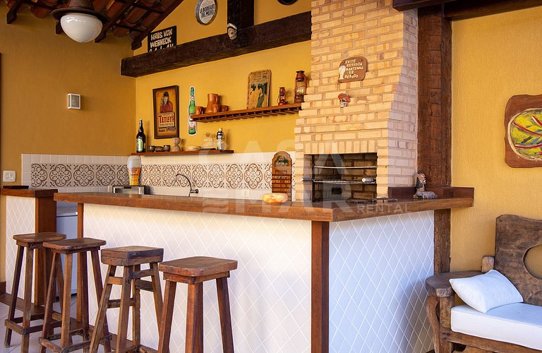 casa com quatro quartos, piscina, próxima à praia