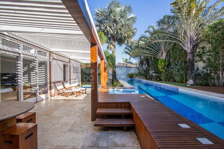 Casa com quatro suítes, piscina, espaço gourmet, jacuzzi