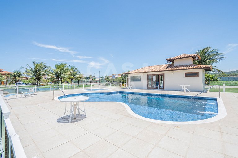 Casa condomínio, três suítes, ar, quadra de tênis