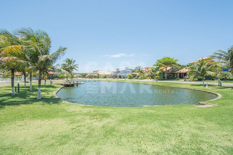 Casa condomínio, três suítes, ar, quadra de tênis