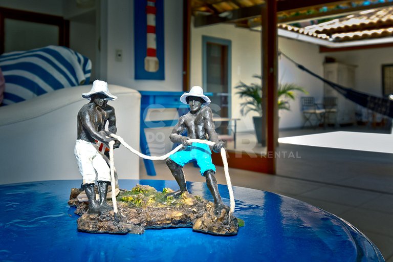 Casa condomínio, três suítes, ar, quadra de tênis