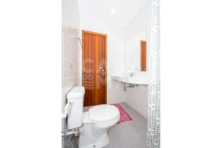 Casa condomínio, três suítes, ar, quadra de tênis