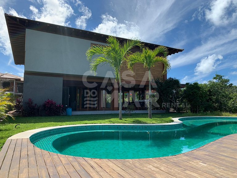 Sensacional Villa, com quatro suítes, localizada no Condomín