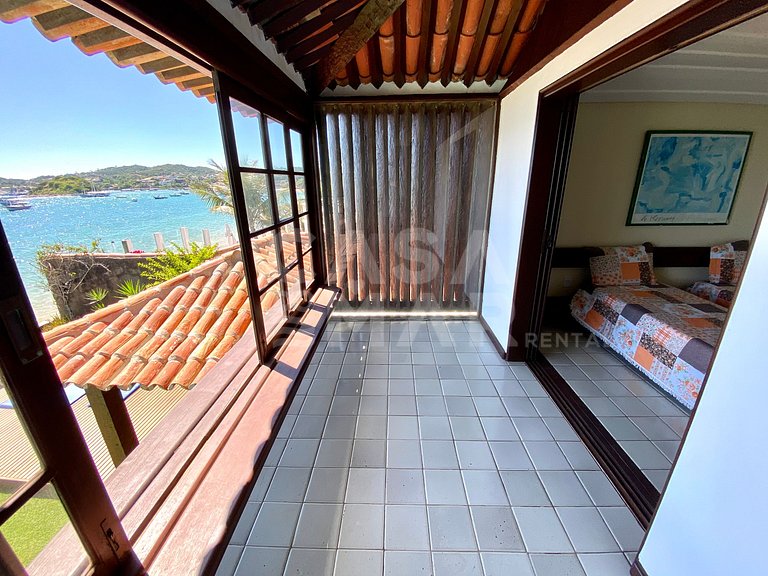 Linda casa com cinco suítes, pé na areia na praia do Canto