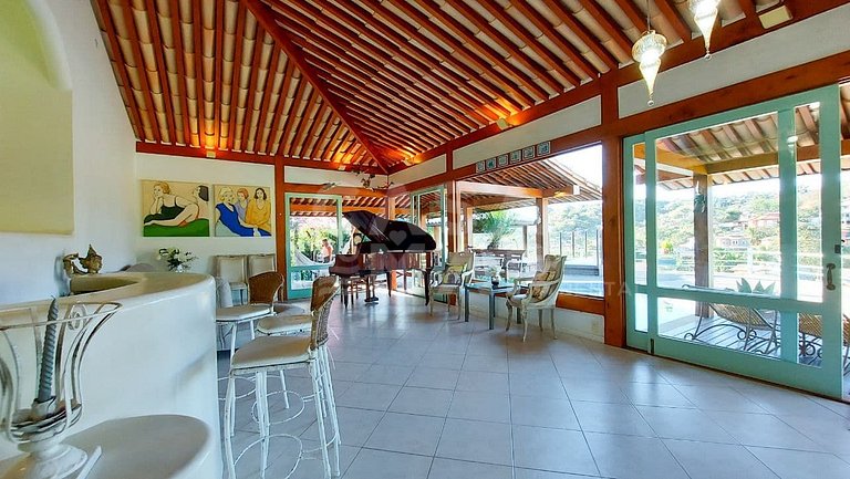 LINDA CASA DE CONDOMÍNIO COM VISTA PRIVILEGIADA PARA PRAIA D