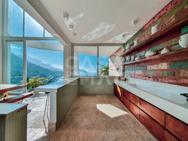 Mansão no Joá, com piscina de borda infinita com vista linda