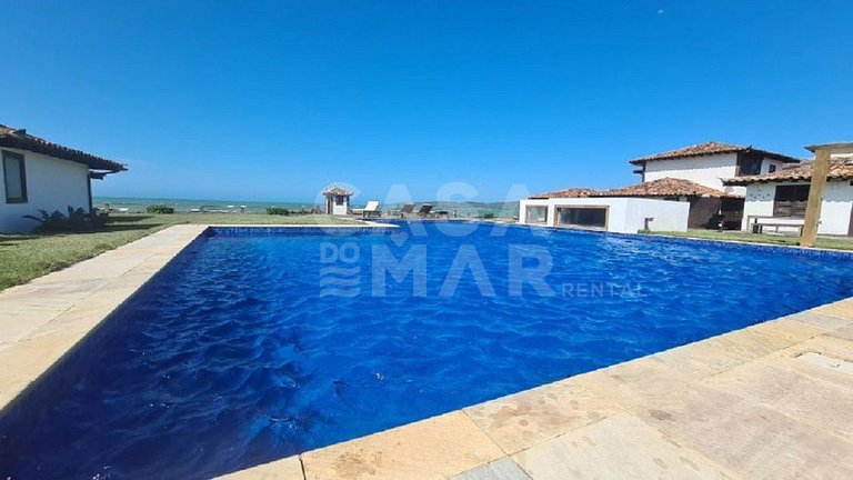 Uma casa charmosa, em condomínio pé na areia, Praia Rasa.