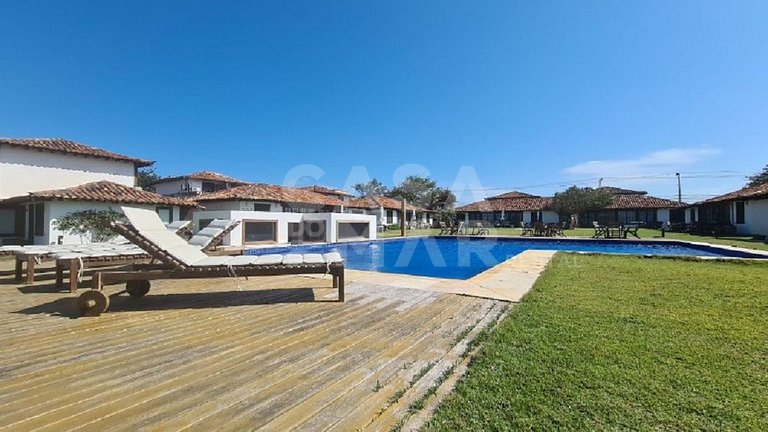 Uma casa charmosa, em condomínio pé na areia, Praia Rasa.