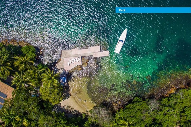 Uma ilha excepcional com sete suítes, píer, sala de cinema