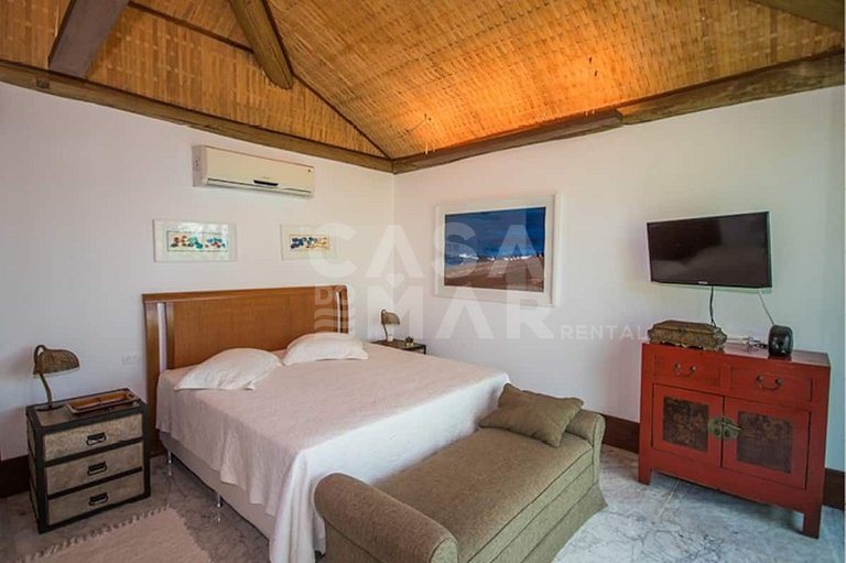 Uma ilha excepcional com sete suítes, píer, sala de cinema