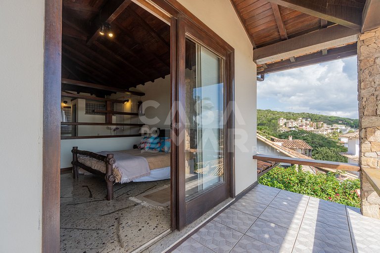 Linda casa com 4 suítes, em condomínio, no canto direito de