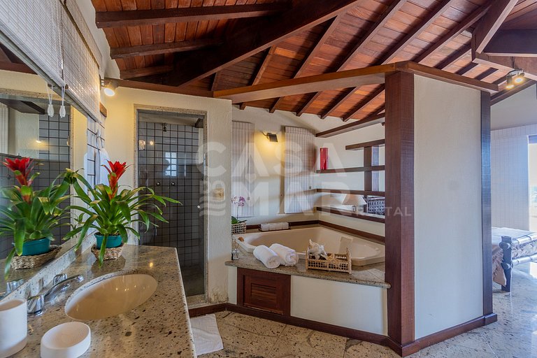 Linda casa com 4 suítes, em condomínio, no canto direito de