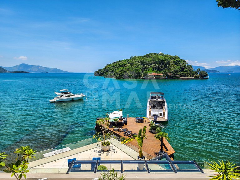 Casa espetacular com 9 suítes, frente mar, completíssima