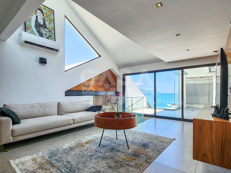 Casa espetacular com 9 suítes, frente mar, completíssima