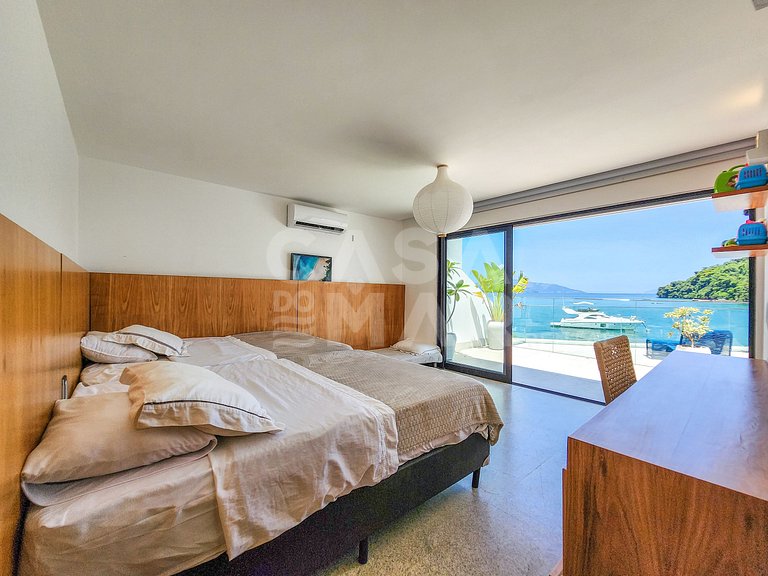 Casa espetacular com 9 suítes, frente mar, completíssima