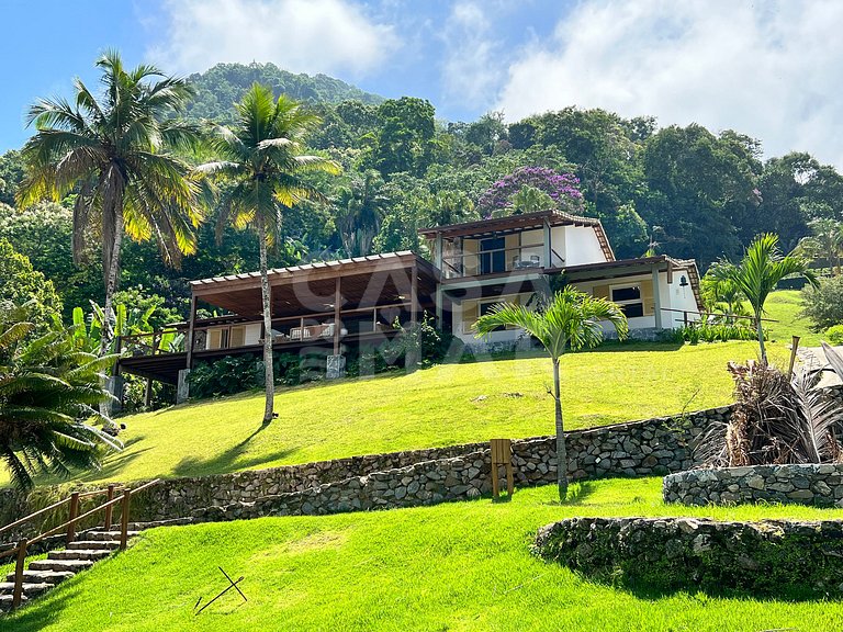 Linda Villa com nove suítes, pé na areia, e total privacidad