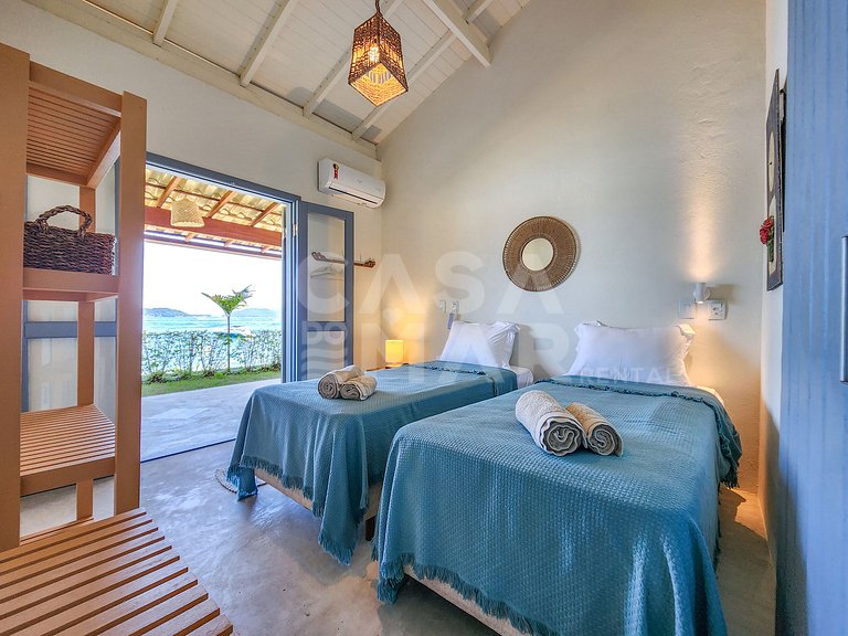 Linda Villa com nove suítes, pé na areia, e total privacidad