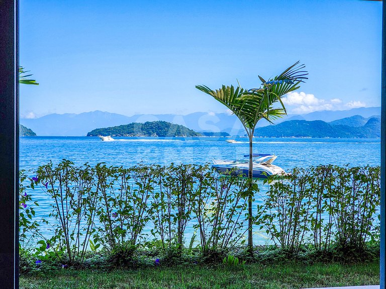 Linda Villa com nove suítes, pé na areia, e total privacidad