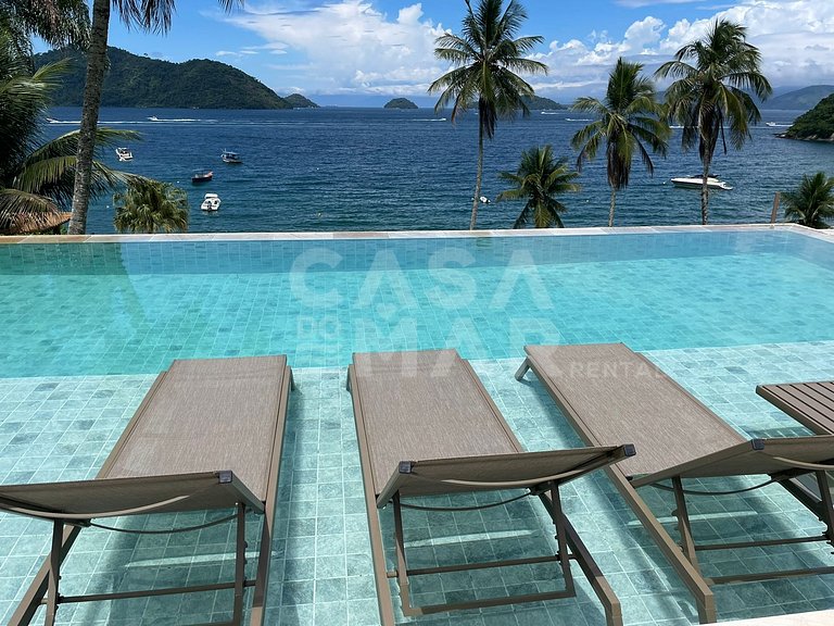 Linda Villa com nove suítes, pé na areia, e total privacidad