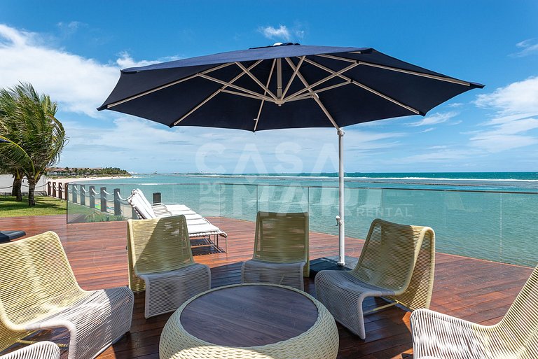 Linda casa com 9 suítes, pé na areia da praia