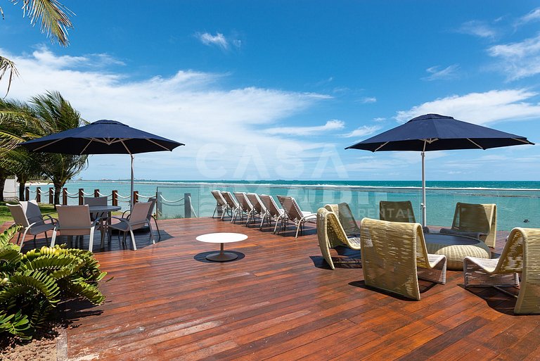 Linda casa com 9 suítes, pé na areia da praia