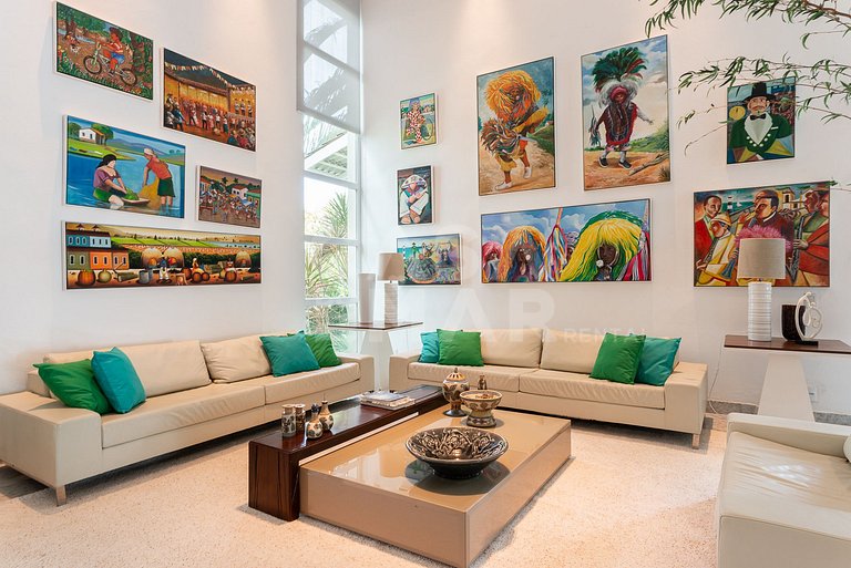 Linda casa com 9 suítes, pé na areia da praia